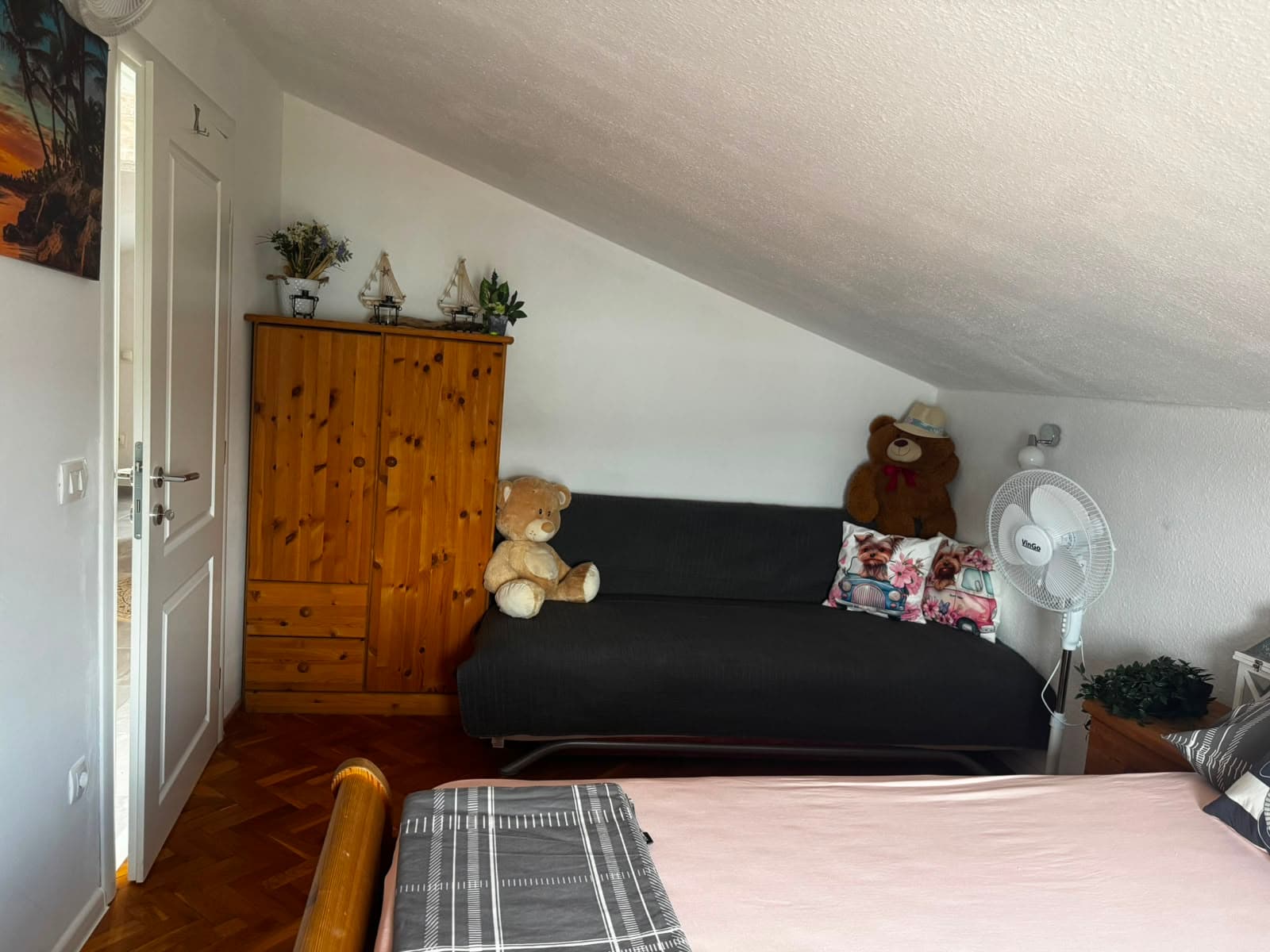 Second bedroom with sofa bed under the roof